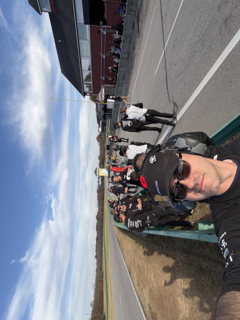 Selfie trackside with race grid behind